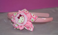 Bandolete rosa com flor e Hello Kitty